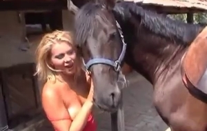 Sweet horse and blonde both enjoy bestiality